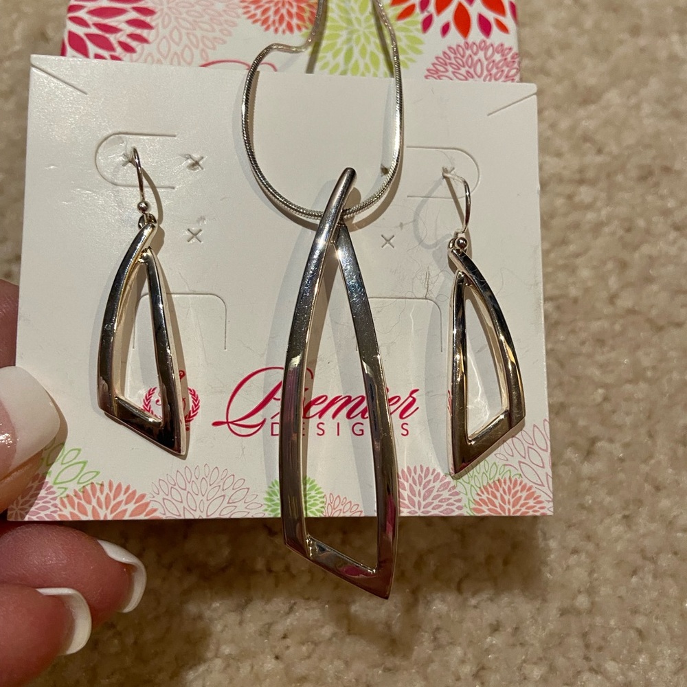 Premier designs pendant and earrings. Rhodium silver